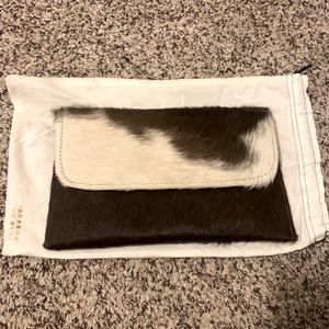 Jackson and Hyde cow clutch wallet and dust bag